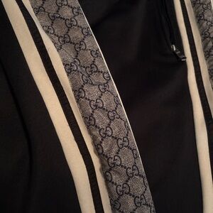 Gucci Black Garment with Logo Tag